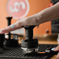 IKAPE press-and-rotate coffee distributor and tamper, view 4